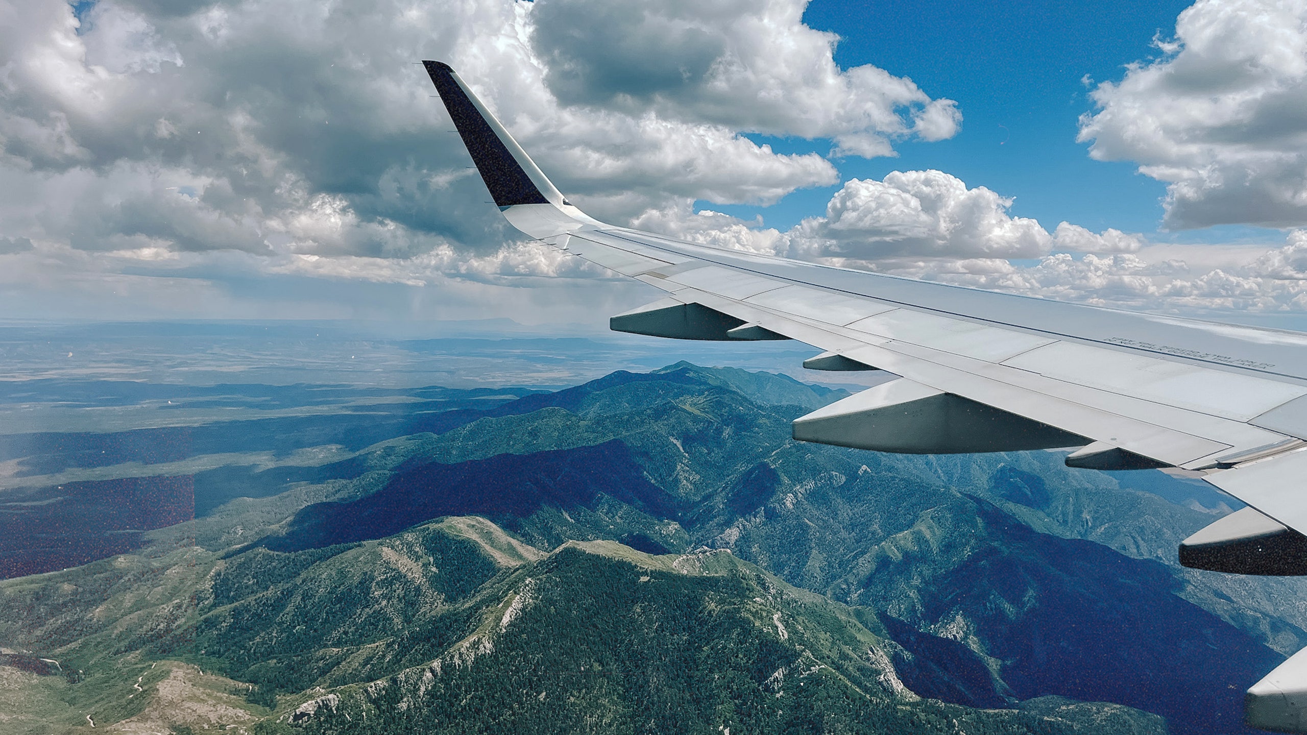 A plane over mountains.