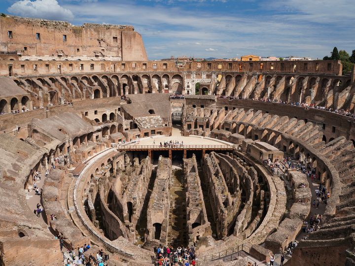 Looking down at the seating and tunnels of the Colosseum in Rome