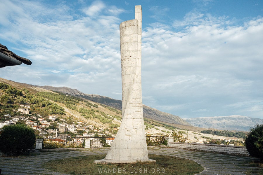 The Gjirokaster Obelisk, a white stone monument dedicated to education and Albanian language on a hill high above the city of Gjirokaster.
