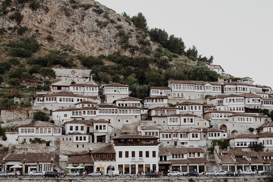 Stone buildings creeping up a hillside.