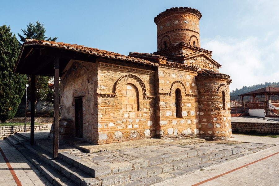 The Holy Church of the Virgin Mary Koubelidiki, one of the most important churches in Kastoria Greece, with a brick exterior and painted frescoes.