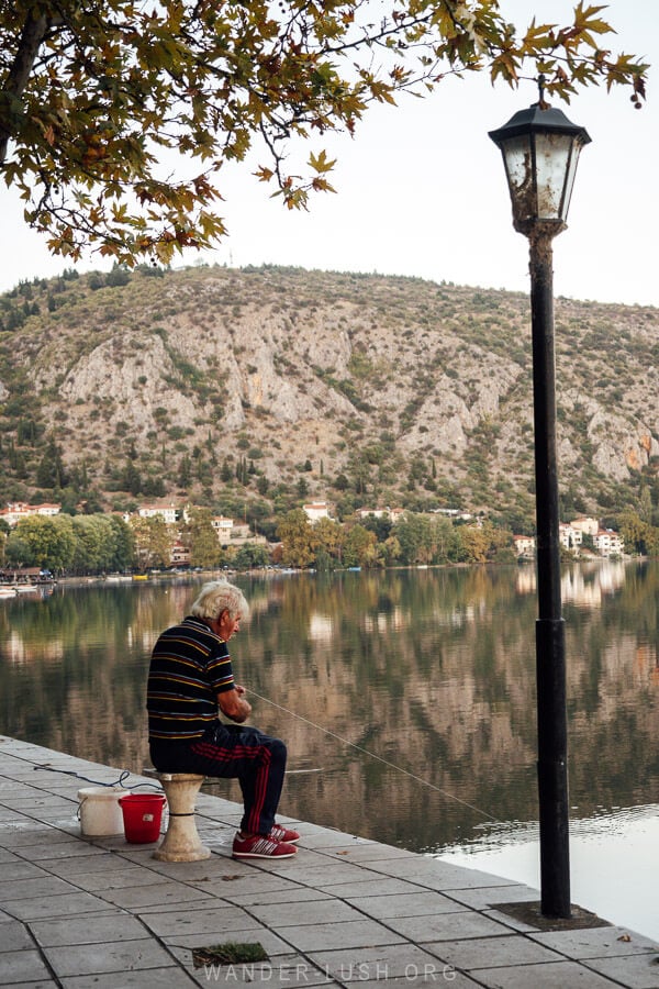 A fisherman on the edge of Lake Orestiada in Kastoria.