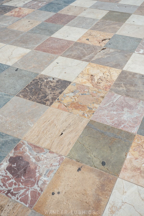 Stone squares in a rainbow of colours on the pavement at Skanderbeg Square in Tirana.