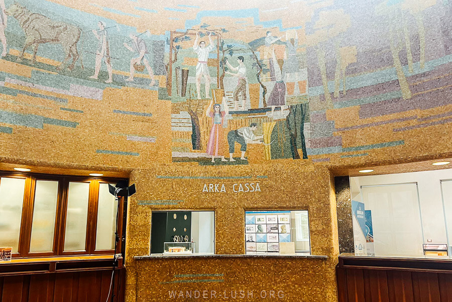 Mosaics inside the Bank of Albanian building depict different images of industry.