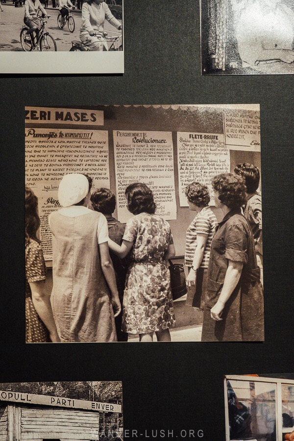 An archival black and white photo depicting a group of women in Tirana in the 1970s.