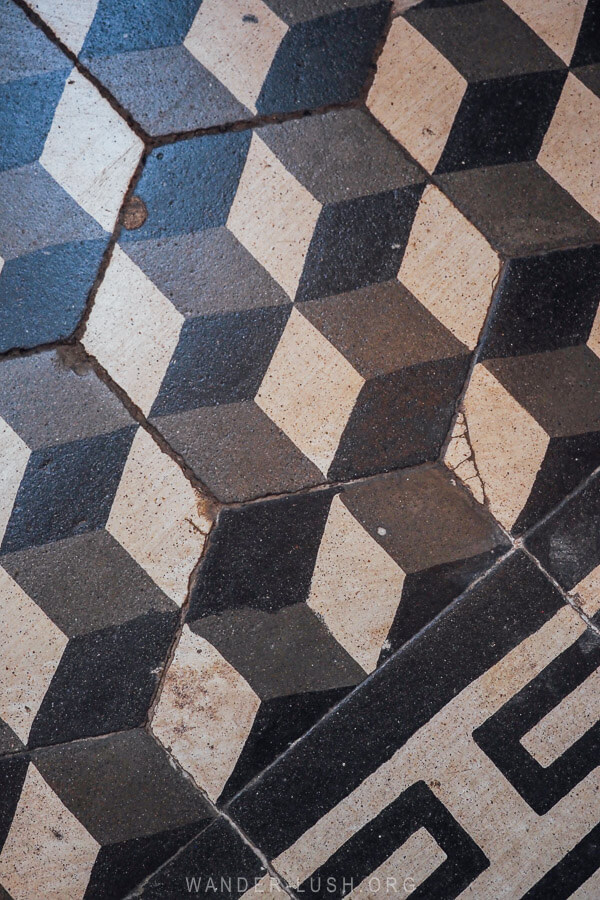 Old fashioned black and white tiles in the entrance to a house in Kutaisi, Georgia.