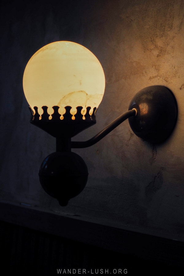 A retro wall lamp inside a boutique hotel in Kutaisi.