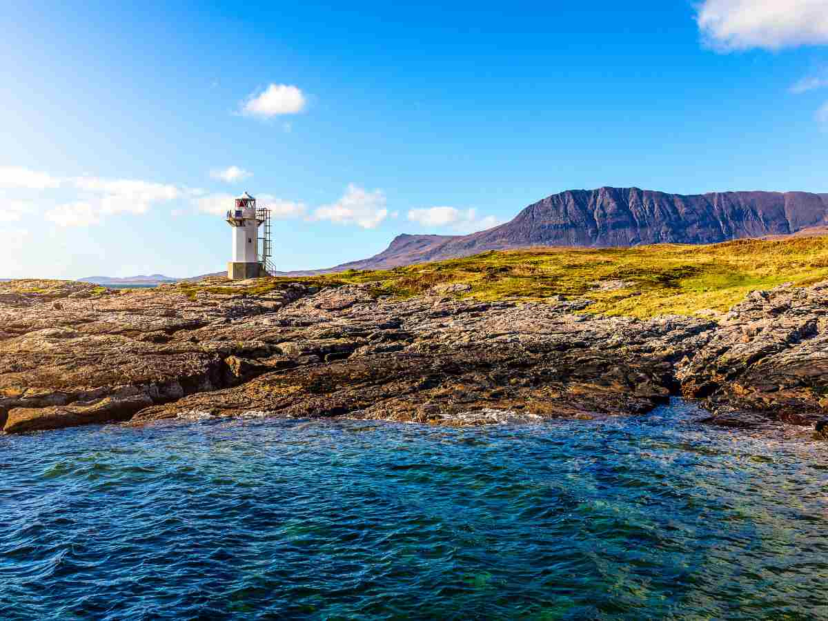 Rhue lighthouse at the entrance to Loch Broom Ullapool Scotland