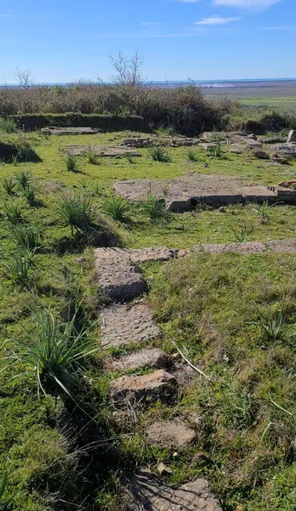 Undiscovered ruins at Apollonia in a field on a clear day