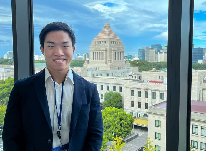 Austin Zeng visiting Japanese members of parliament at the House of Representatives building in 2023, as a representative for an NGO that supports foreign students in Japan.