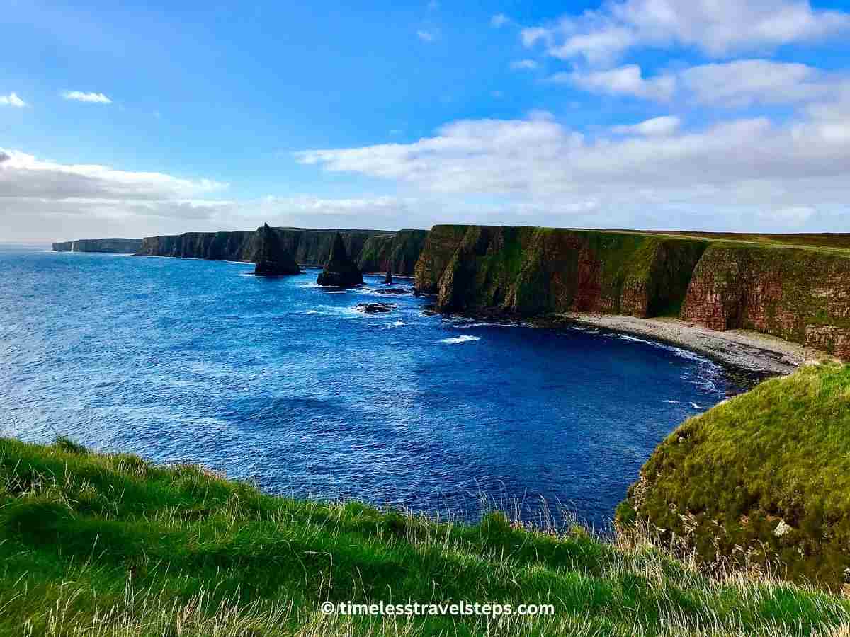 blue sea and Duncansby Stacks at Dunnet Head, Scotland | Timeless Travel Steps
