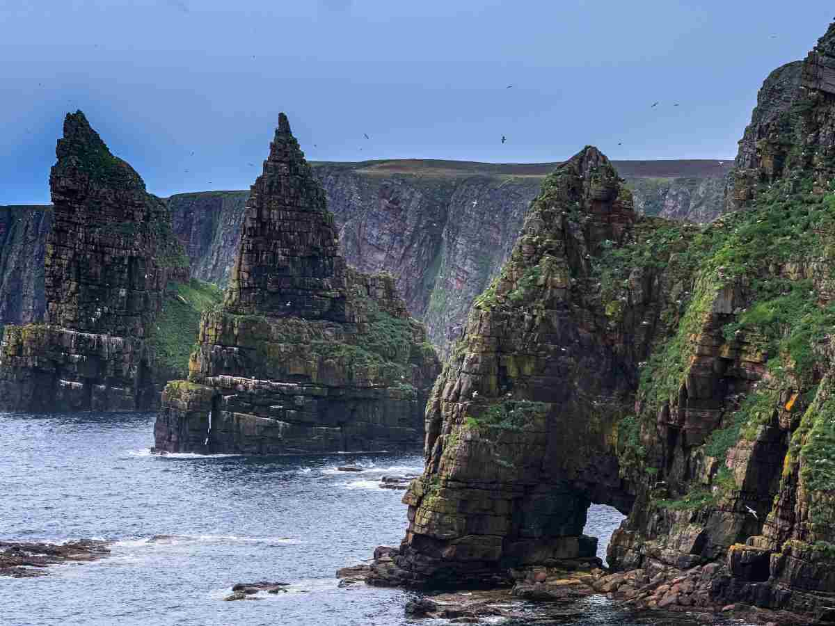 sea stacks at Duncansby Head, Route NC500 Scottish Highlands Timeless Travel Steps