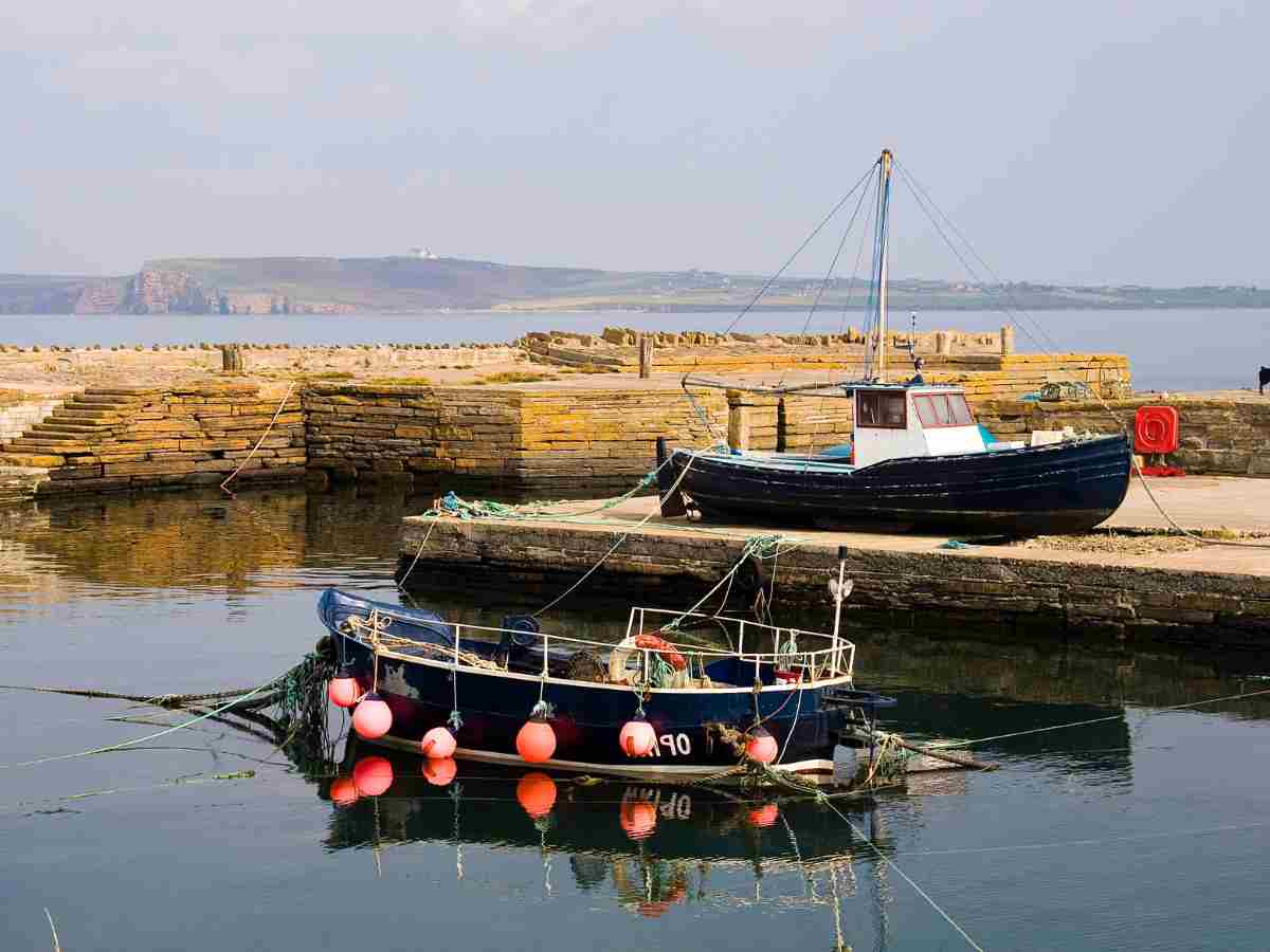 image of a harbour with boats docked