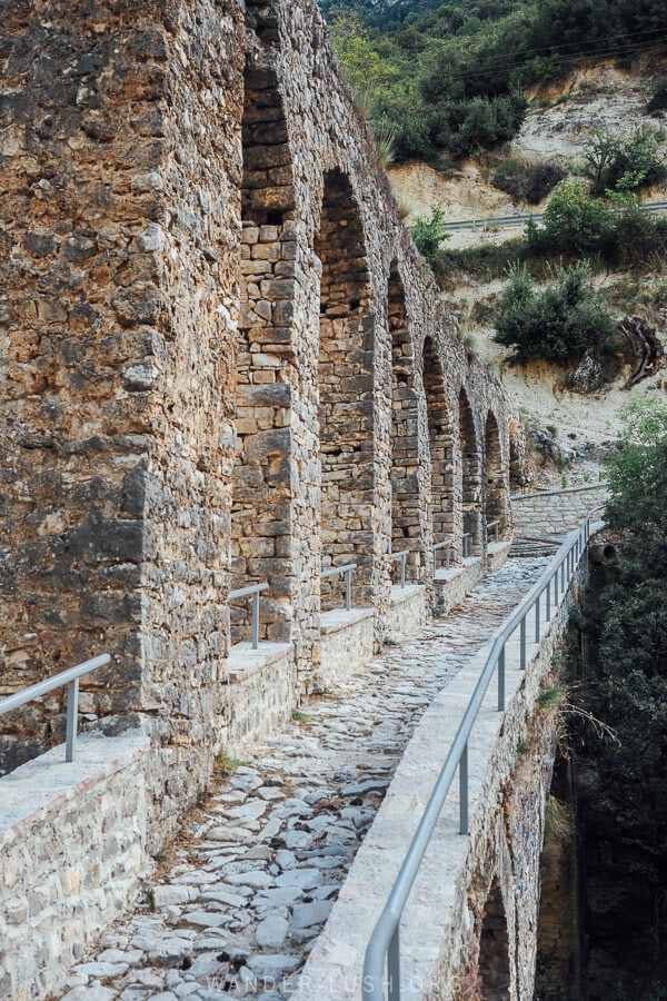 Ali Pasha's Bridge near Tepelena, an Ottoman era stone bridge with a walking path.