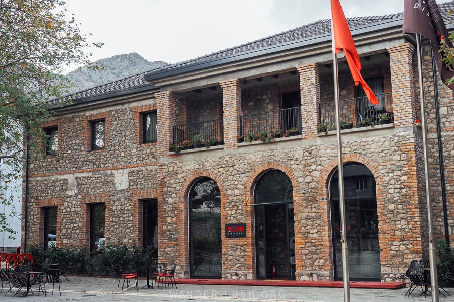 The Melesin Distillery, a grand brick building in Leskovik that has been transformed into a boutique hotel.