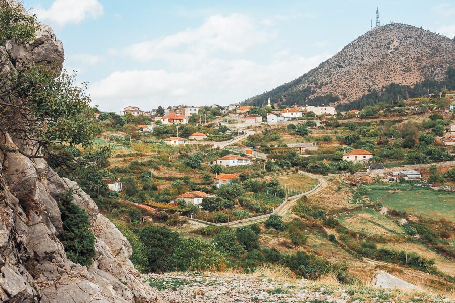 The town of Leskovik in Albania located between two mountain peaks.