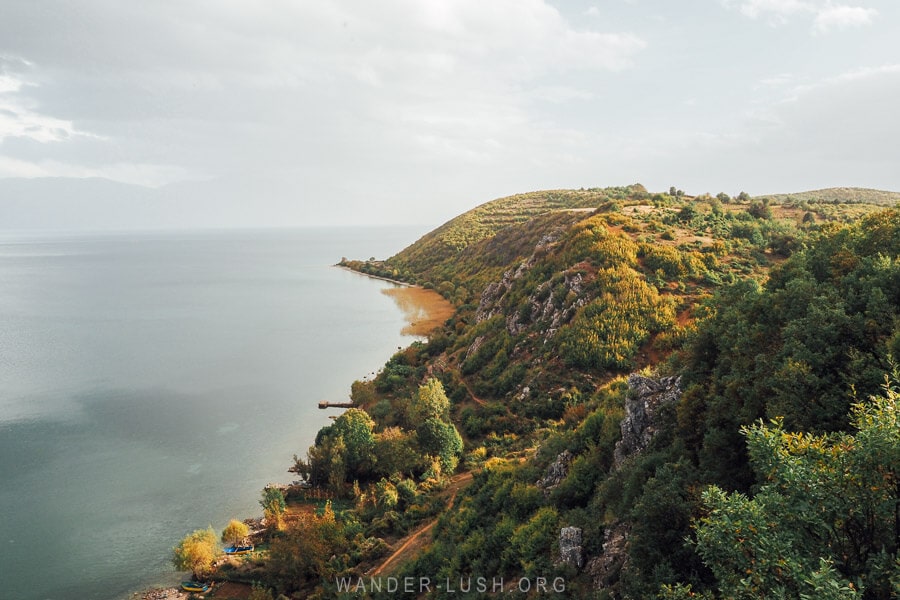 The green headland of a peninsula in Lake Ohrid, Albania.