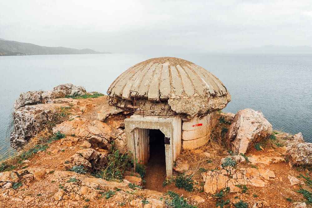 A concrete bunker sits on the peninsula in Lin, Albania overlooking Lake Ohrid.