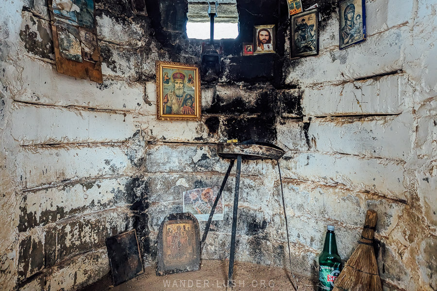 A small chapel with icons and votive candles set up inside the Lin Bunker in Albania.