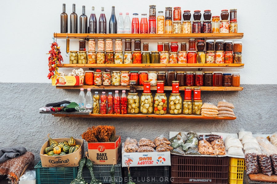 A colourful display of pickles and gliko jams on the street in Lin, Albania.