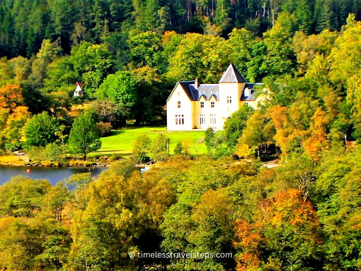 glenfinnan house hotel amidst the autumn golden hues overlooking loch shiel