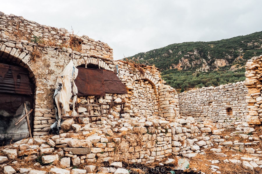 The ruins of Upper Qeparo fortress, a stone castle in the hills.