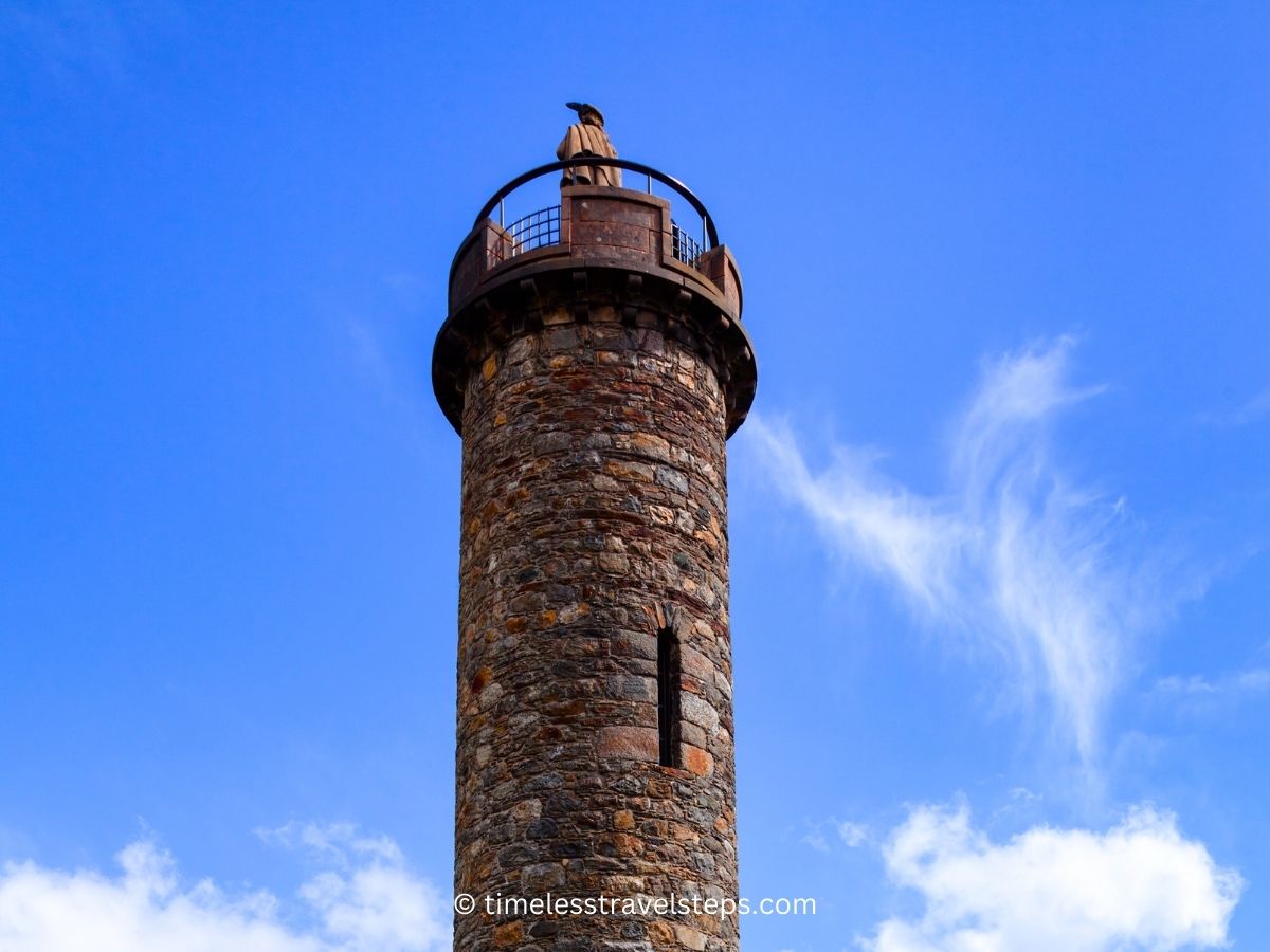 the statue at the top of Glenfinnan Monument Loch Shiel © timelesstravelsteps.com