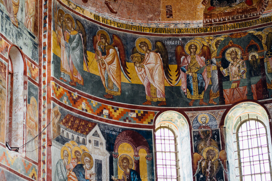 Vivid frescoes decorate the interior dome at Gelati Monastery in Kutaisi, Georgia.