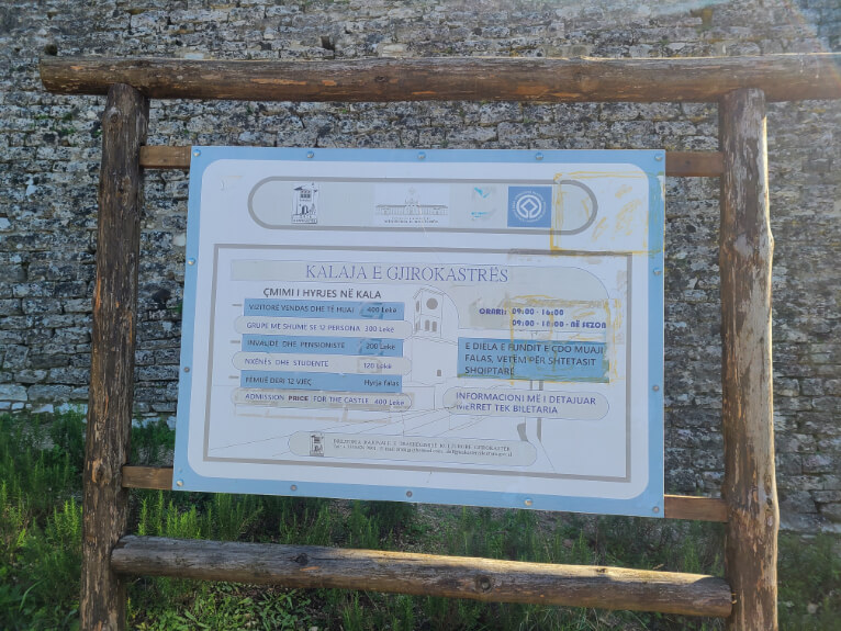 Hours and Admission sign outside of Gjirokastra Castle