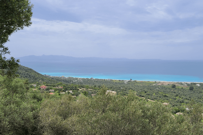 The beach and turquoise waters far below the hills of Borsh