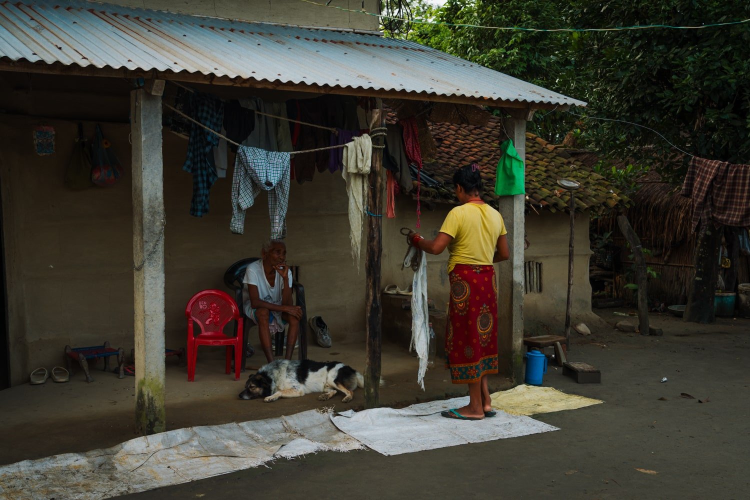 Local Tharu family at their home in Barauli village, Nepal.