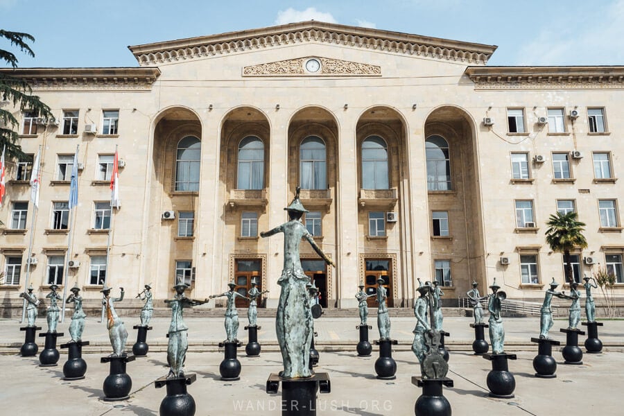 The Rustavi Mayor's Office, with a sculptural ensemble of a copper orchestra in front.