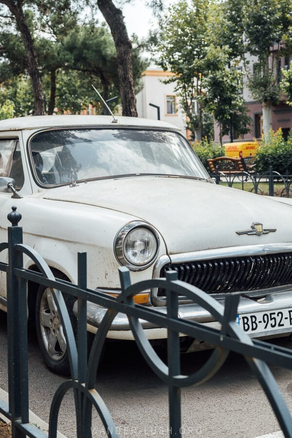 A retro car parked on the street in Rustavi, Georgia.