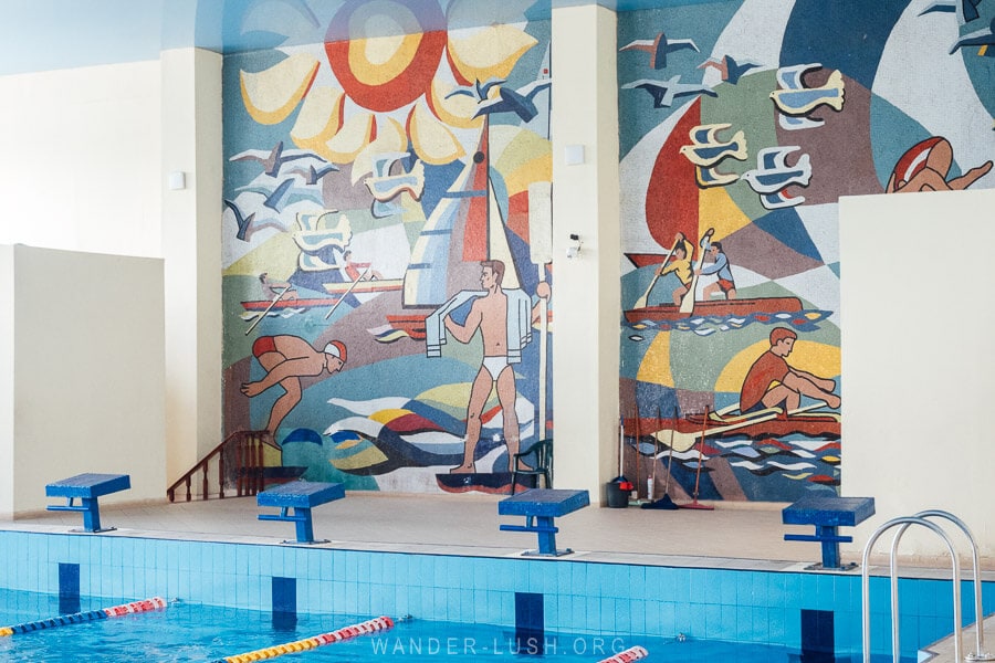 An indoor swimming pool in Rustavi, Georgia decorated with colourful Soviet mosaics.