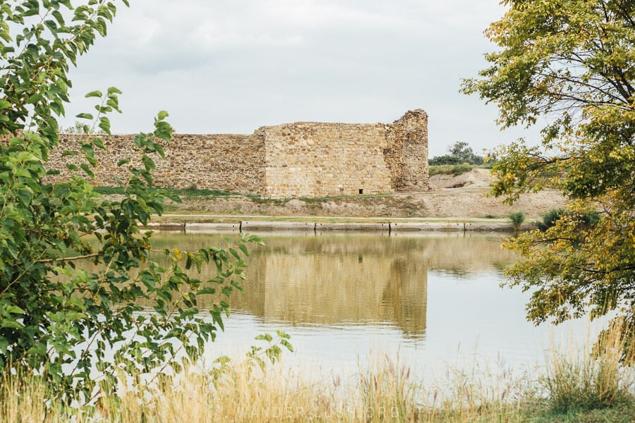 The ruins of Rustavi Fotress, a stone fortification on the edge of an artificial lake.