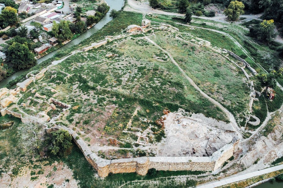 An aerial drone photo of Rustavi Fortress, with the outline of the fortification visible.