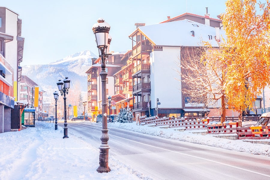 The pretty ski town of Bansko, Bulgaria, with its chalets and old-style light posts.