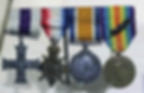 A close up of 4 medals