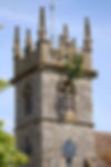 Oak branch hanging from church tower