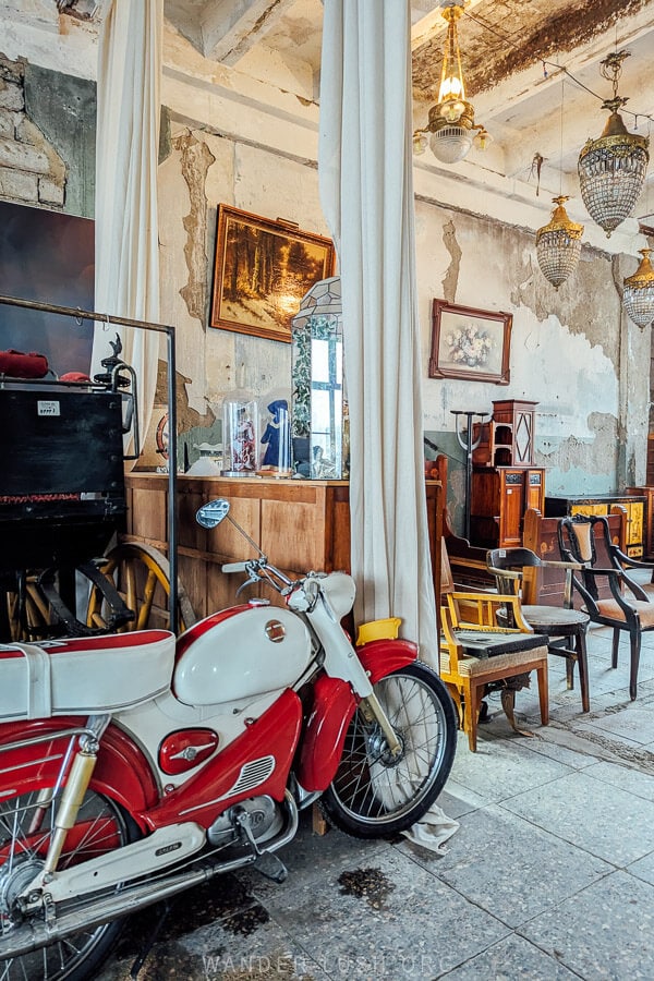 A vintage motorbike for sale at an antique shop in Tbilisi.