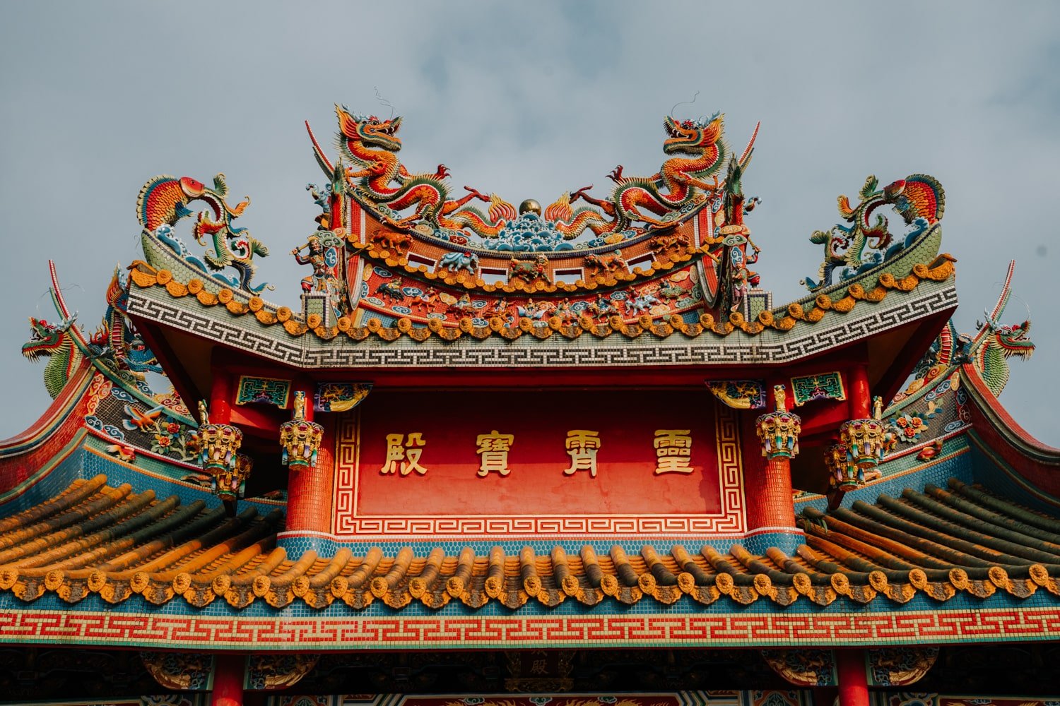 Ornate rooftop of Jiufen Tian Gong Temple, Taiwan.