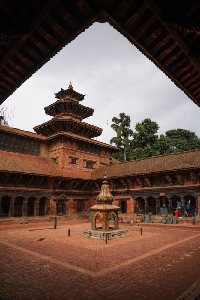 A temple pagoda and a courtyard inside the royal palace complex of Patan.