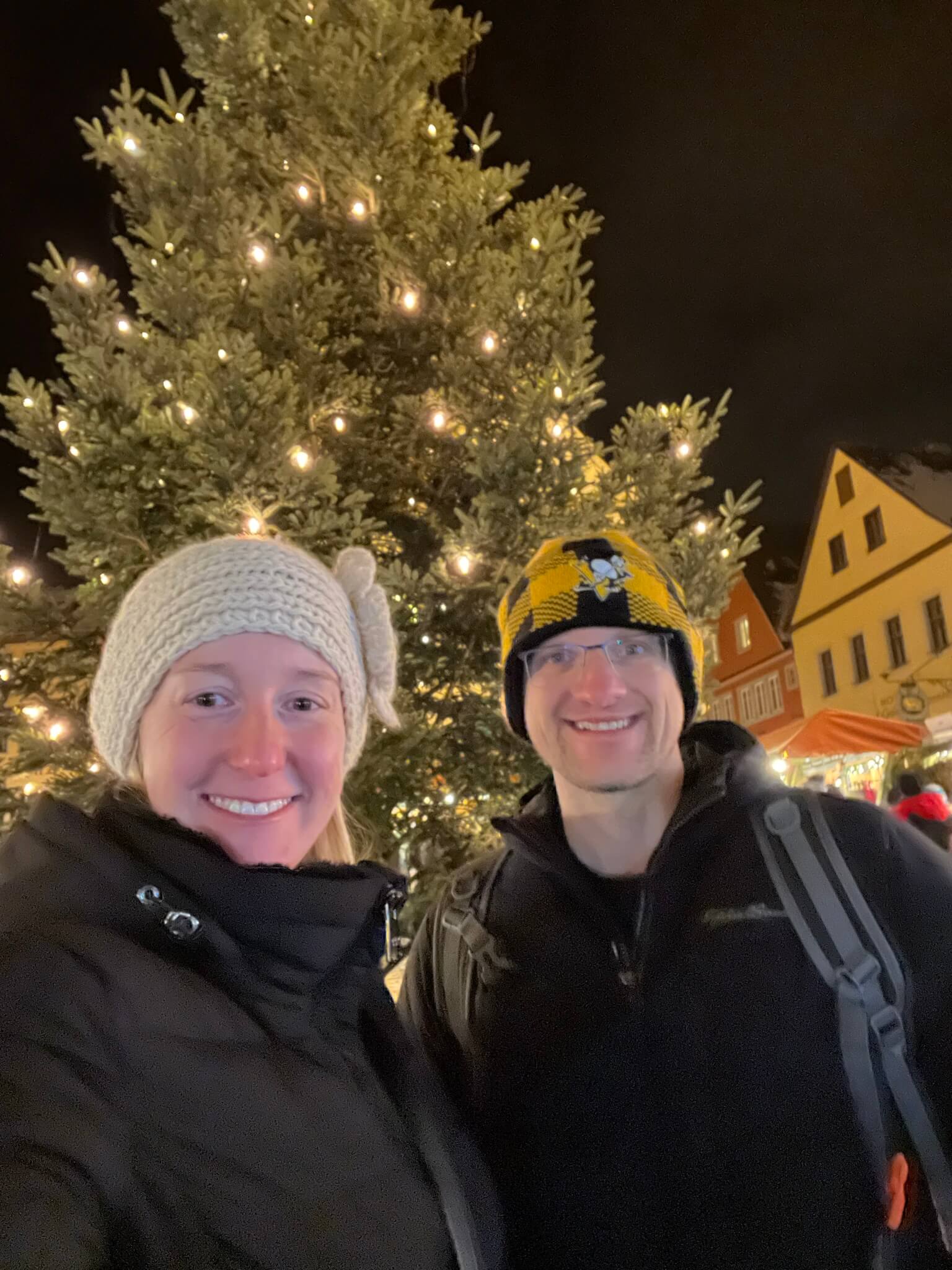 Selfie of Paul and Michelle in front of a Christmas tree in Rothenburg ob der Tauber, Germany