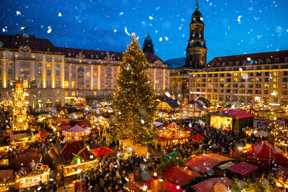 Shoppers and tourists browsing the Dresden Christmas Market in Germany