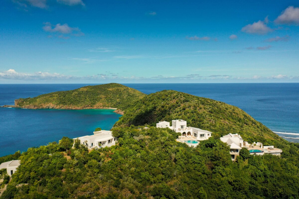 Lush greenery of Guana Island and the blue ocean