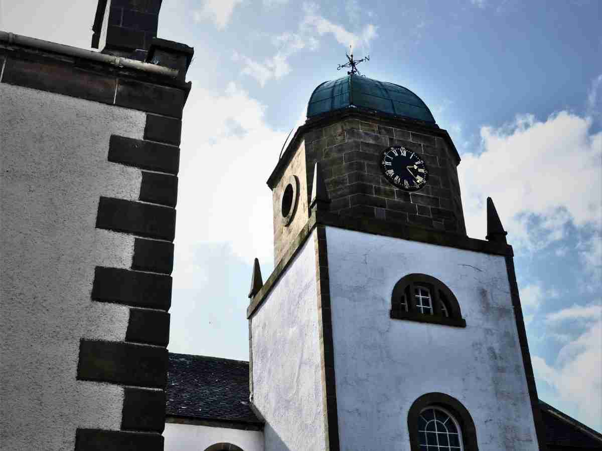 Cromarty courthouse showcasing a distinct old clock on the tower