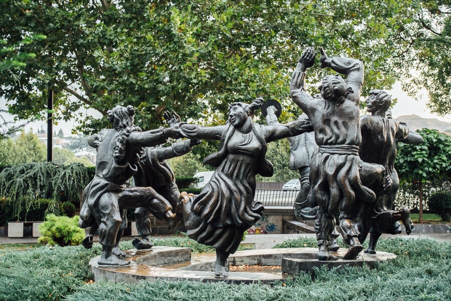 Berikaoba Statue in Tbilisi, depicting people celebrating the traditional Georgian harvest festival.