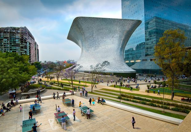 Mexico regularly ranks highly among countries offering satisfaction for expats. The aluminum-paneled Soumaya Museum stands in Plaza Carso in the Polanco district of Mexico City.(John Coletti/The Image Bank Unreleased/Getty Images)