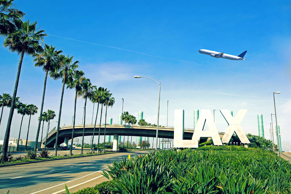 plane flying from LAX