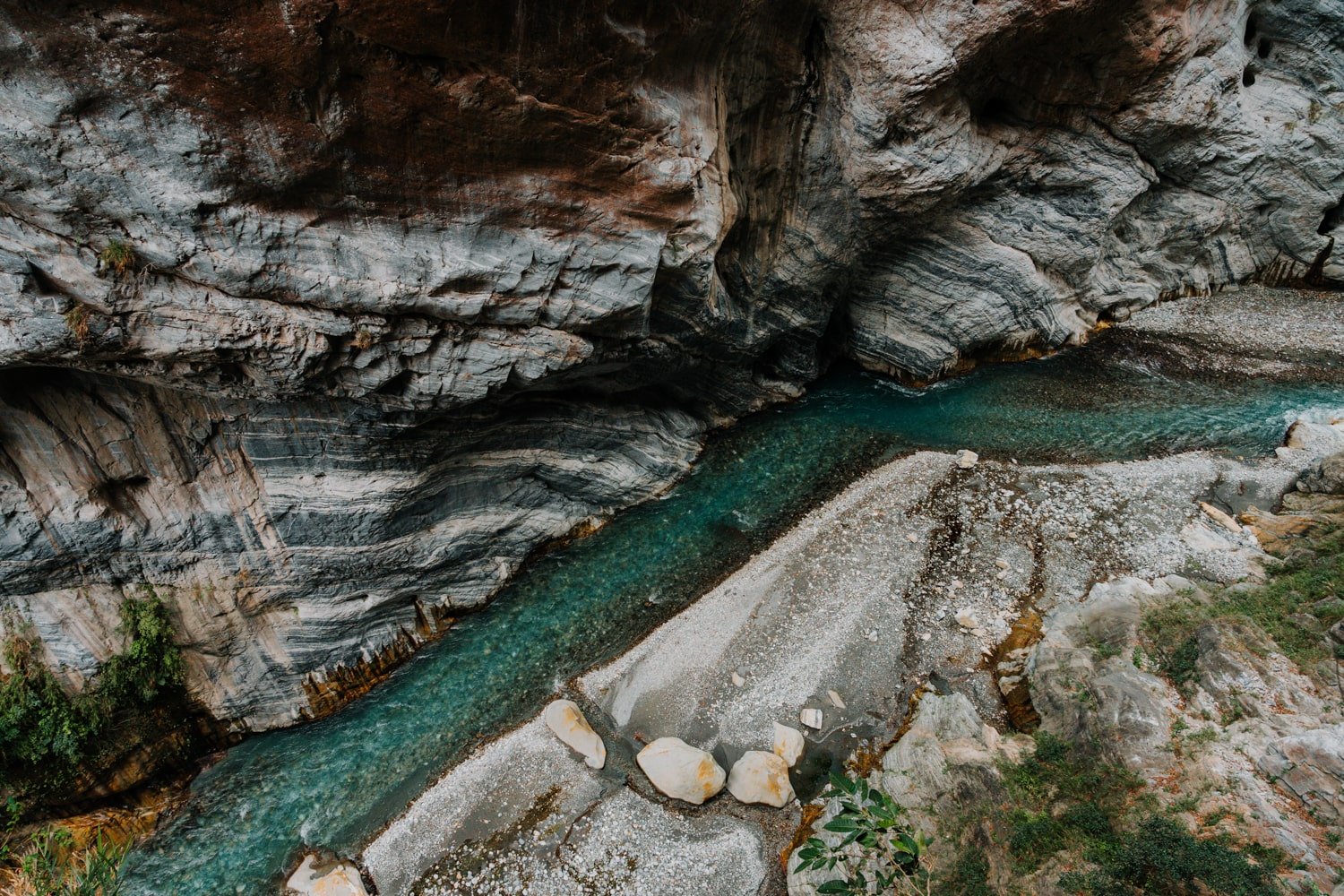 The blue Liwu River inside Taroko Gorge with marbled canyon walls.